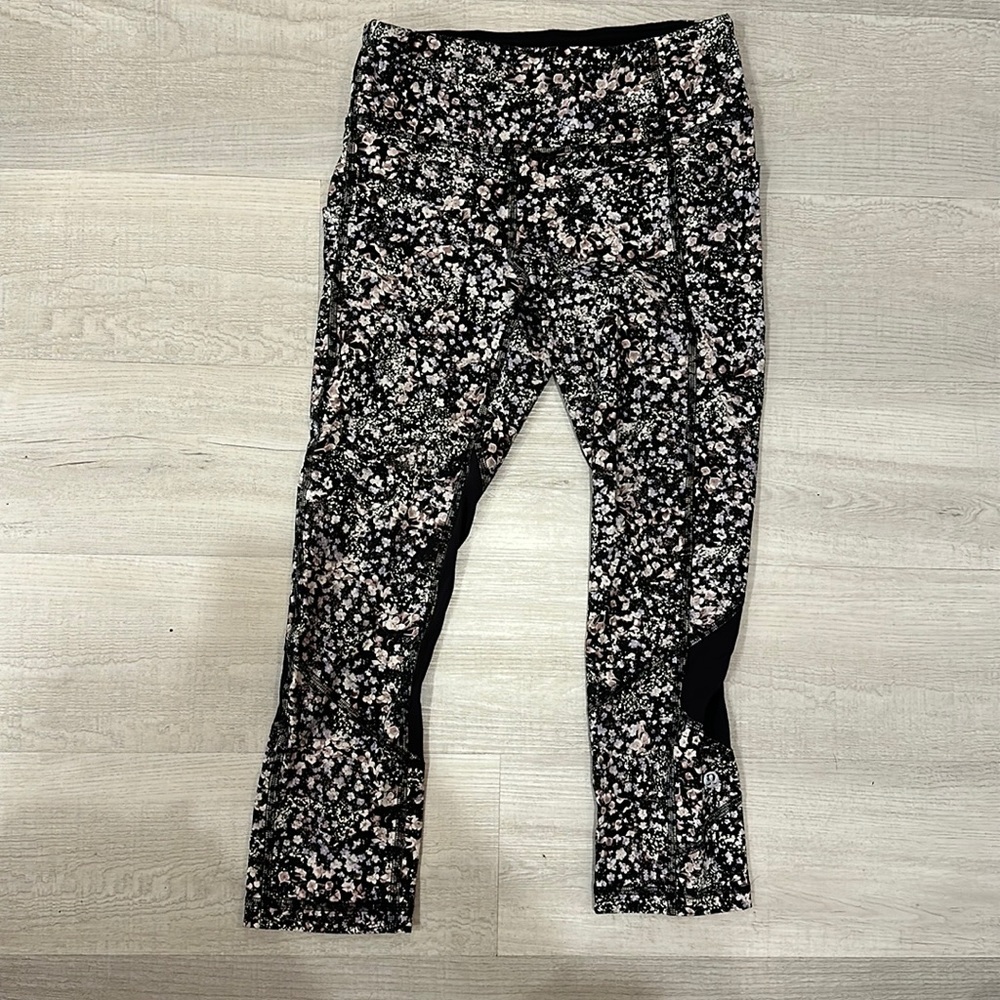 Black and lavender floral Lululemon capri leggings